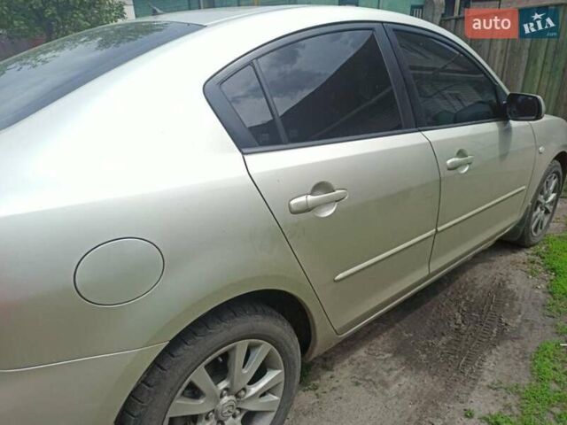 Бежевый Мазда 3, объемом двигателя 1.6 л и пробегом 270 тыс. км за 4399 $, фото 6 на Automoto.ua