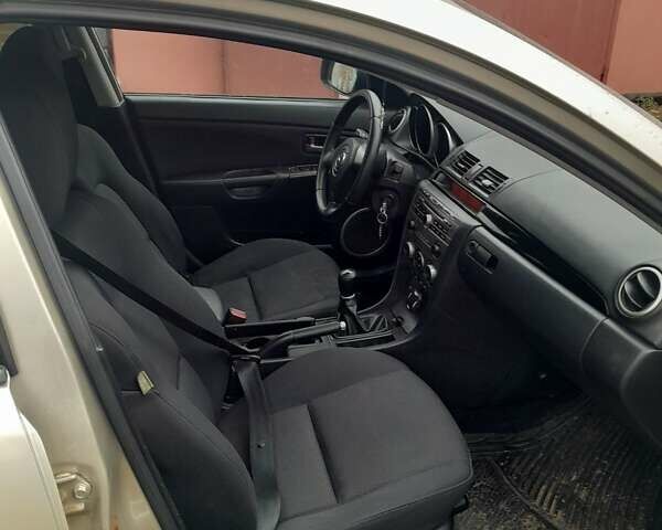 Бежевий Мазда 3, об'ємом двигуна 1.6 л та пробігом 200 тис. км за 4500 $, фото 6 на Automoto.ua