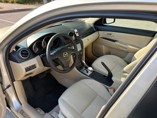 Бежевый Мазда 3, объемом двигателя 1.6 л и пробегом 154 тыс. км за 6399 $, фото 16 на Automoto.ua