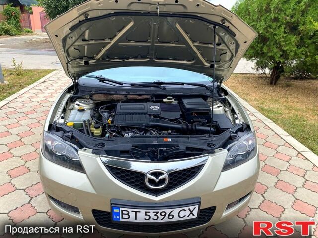 Бежевый Мазда 3, объемом двигателя 1.6 л и пробегом 178 тыс. км за 5200 $, фото 2 на Automoto.ua
