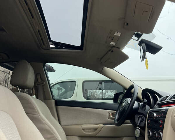 Бежевый Мазда 3, объемом двигателя 1.6 л и пробегом 135 тыс. км за 5199 $, фото 45 на Automoto.ua