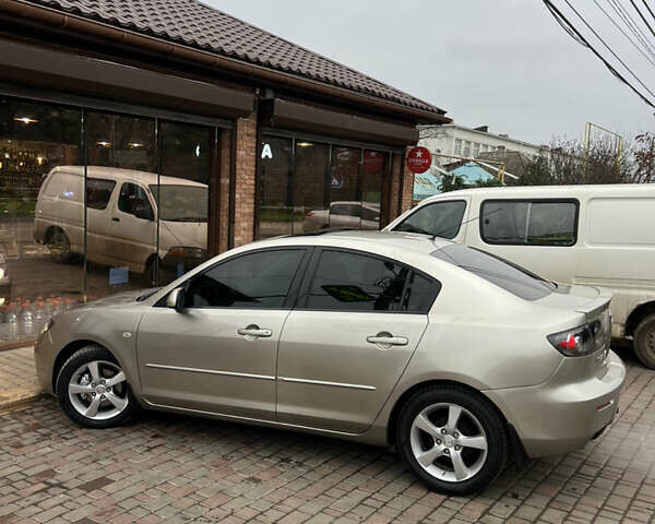 Бежевый Мазда 3, объемом двигателя 1.6 л и пробегом 135 тыс. км за 5199 $, фото 24 на Automoto.ua