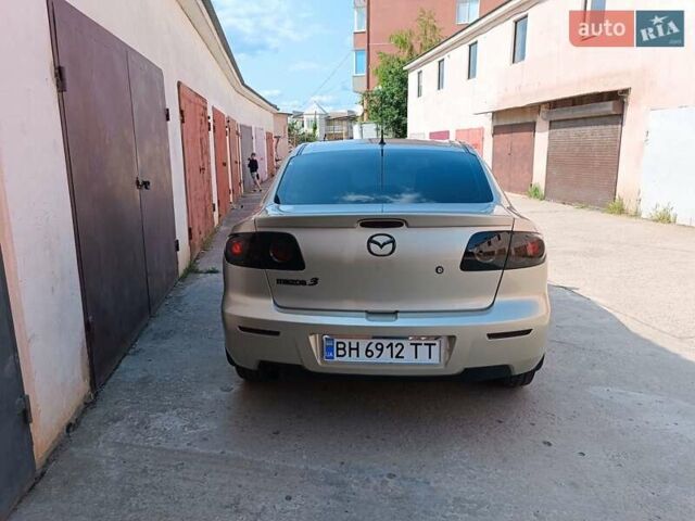 Бежевий Мазда 3, об'ємом двигуна 1.6 л та пробігом 280 тис. км за 4650 $, фото 3 на Automoto.ua