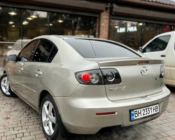 Бежевый Мазда 3, объемом двигателя 1.6 л и пробегом 135 тыс. км за 5199 $, фото 25 на Automoto.ua