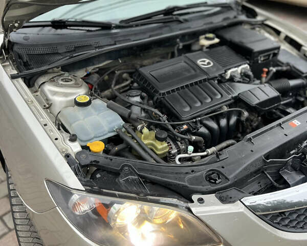 Бежевый Мазда 3, объемом двигателя 1.6 л и пробегом 135 тыс. км за 5199 $, фото 37 на Automoto.ua