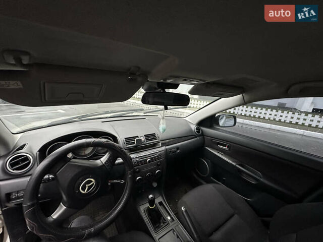 Бежевый Мазда 3, объемом двигателя 1.6 л и пробегом 350 тыс. км за 3700 $, фото 4 на Automoto.ua