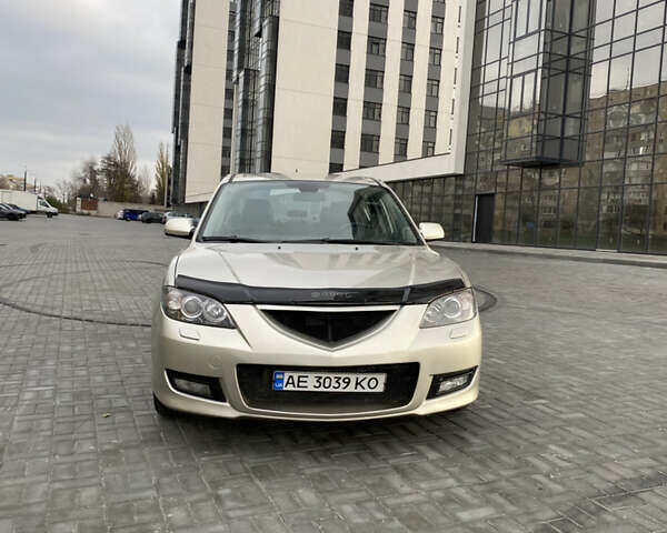 Бежевый Мазда 3, объемом двигателя 2 л и пробегом 214 тыс. км за 4750 $, фото 1 на Automoto.ua