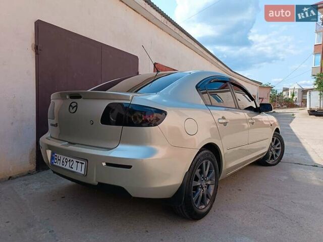 Бежевий Мазда 3, об'ємом двигуна 1.6 л та пробігом 280 тис. км за 4650 $, фото 4 на Automoto.ua