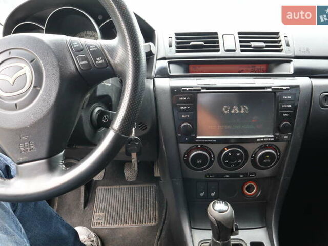 Бежевый Мазда 3, объемом двигателя 2 л и пробегом 170 тыс. км за 5700 $, фото 14 на Automoto.ua