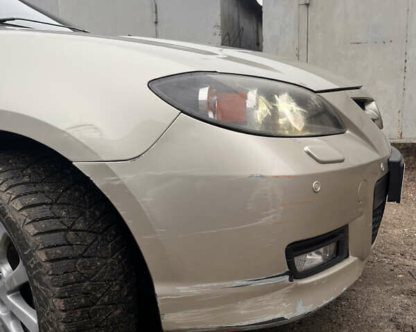 Бежевый Мазда 3, объемом двигателя 2 л и пробегом 147 тыс. км за 5000 $, фото 8 на Automoto.ua