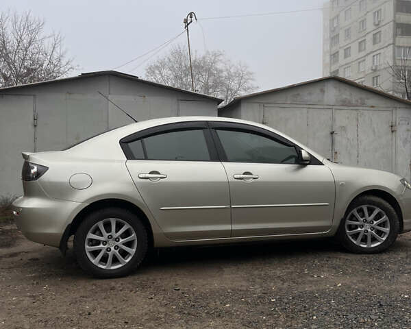 Бежевый Мазда 3, объемом двигателя 2 л и пробегом 147 тыс. км за 5000 $, фото 7 на Automoto.ua