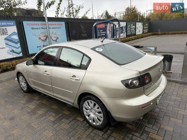 Бежевий Мазда 3, об'ємом двигуна 1.6 л та пробігом 230 тис. км за 5000 $, фото 8 на Automoto.ua
