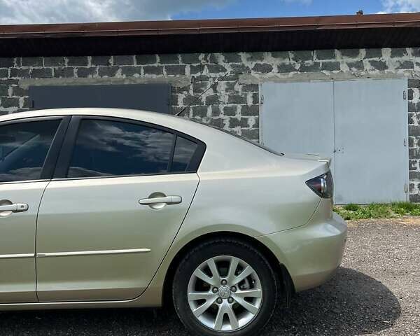 Бежевый Мазда 3, объемом двигателя 1.6 л и пробегом 96 тыс. км за 6200 $, фото 33 на Automoto.ua