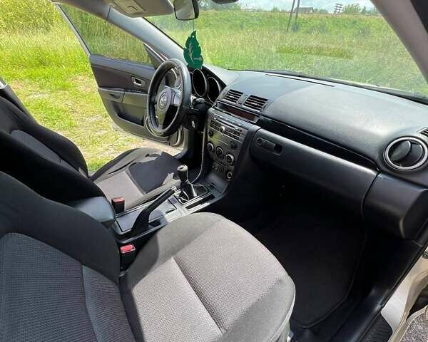 Бежевый Мазда 3, объемом двигателя 1.6 л и пробегом 96 тыс. км за 6200 $, фото 29 на Automoto.ua