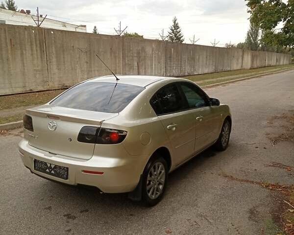 Бежевий Мазда 3, об'ємом двигуна 1.6 л та пробігом 221 тис. км за 4900 $, фото 4 на Automoto.ua