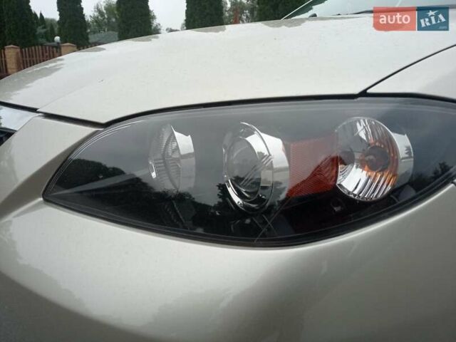 Бежевий Мазда 3, об'ємом двигуна 2 л та пробігом 32 тис. км за 8800 $, фото 9 на Automoto.ua