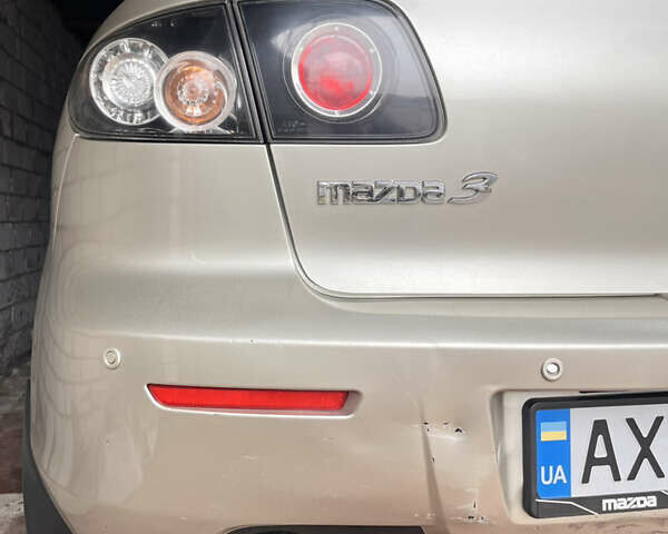 Бежевый Мазда 3, объемом двигателя 2 л и пробегом 147 тыс. км за 5000 $, фото 2 на Automoto.ua