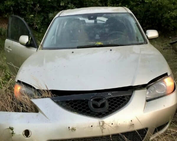 Бежевый Мазда 3, объемом двигателя 1.6 л и пробегом 222 тыс. км за 1500 $, фото 2 на Automoto.ua