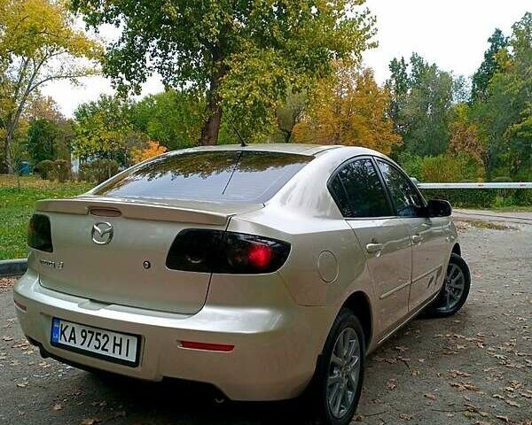 Бежевый Мазда 3, объемом двигателя 1.6 л и пробегом 222 тыс. км за 5600 $, фото 1 на Automoto.ua