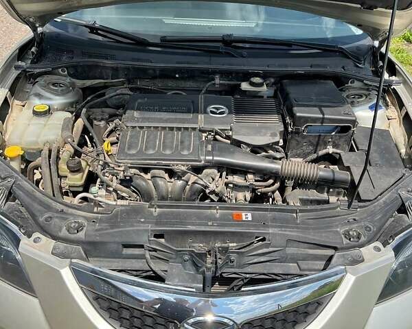 Бежевый Мазда 3, объемом двигателя 1.6 л и пробегом 96 тыс. км за 6200 $, фото 28 на Automoto.ua