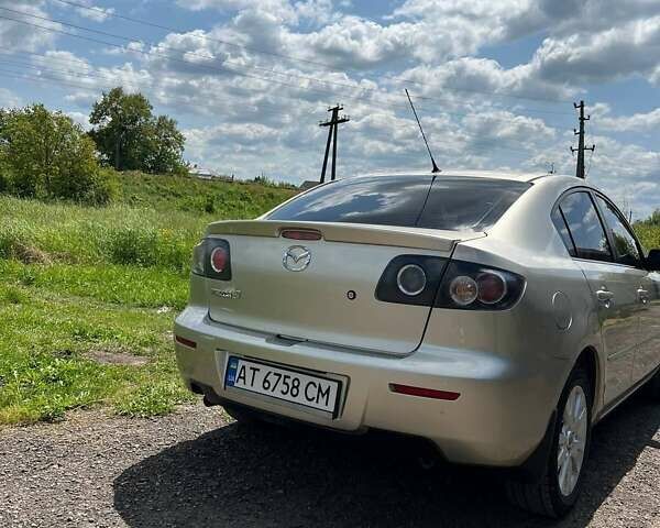 Бежевый Мазда 3, объемом двигателя 1.6 л и пробегом 96 тыс. км за 6200 $, фото 6 на Automoto.ua