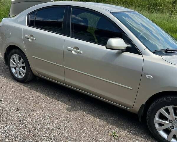 Бежевый Мазда 3, объемом двигателя 1.6 л и пробегом 96 тыс. км за 6200 $, фото 31 на Automoto.ua