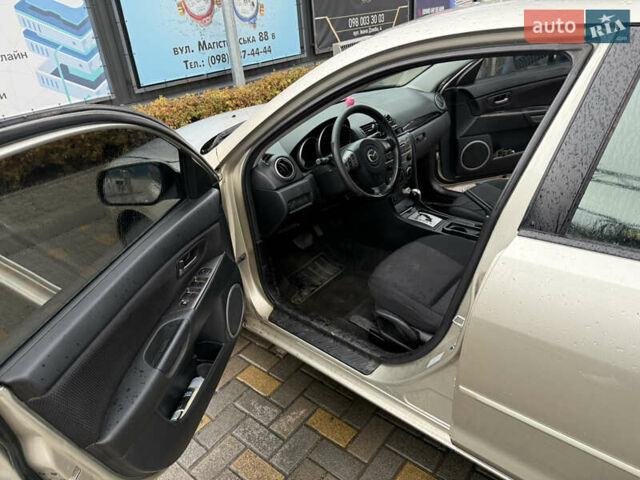 Бежевий Мазда 3, об'ємом двигуна 1.6 л та пробігом 230 тис. км за 5000 $, фото 15 на Automoto.ua