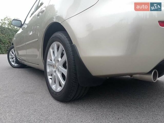 Бежевий Мазда 3, об'ємом двигуна 2 л та пробігом 32 тис. км за 8800 $, фото 12 на Automoto.ua
