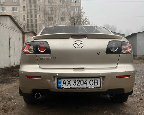 Бежевый Мазда 3, объемом двигателя 2 л и пробегом 147 тыс. км за 5000 $, фото 5 на Automoto.ua