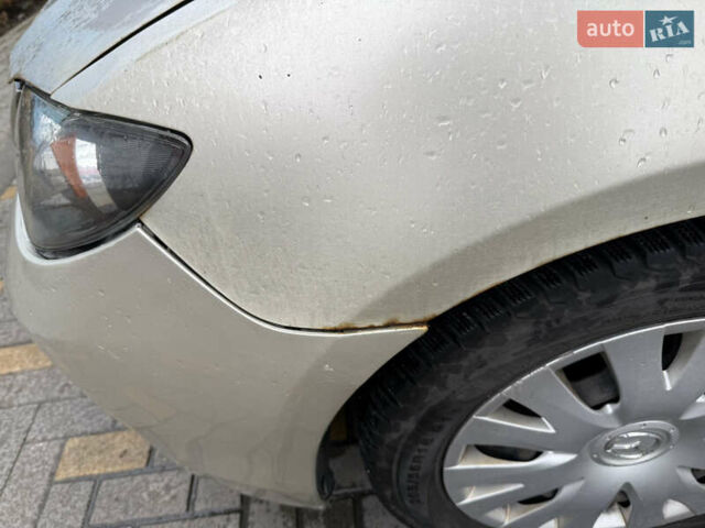 Бежевий Мазда 3, об'ємом двигуна 1.6 л та пробігом 230 тис. км за 5000 $, фото 6 на Automoto.ua