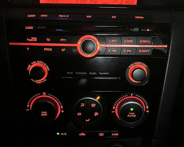 Бежевый Мазда 3, объемом двигателя 2 л и пробегом 147 тыс. км за 5000 $, фото 4 на Automoto.ua