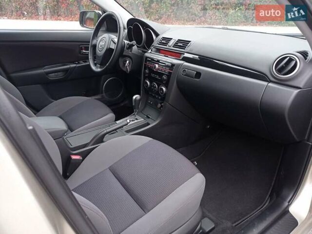 Бежевий Мазда 3, об'ємом двигуна 2 л та пробігом 32 тис. км за 8800 $, фото 17 на Automoto.ua