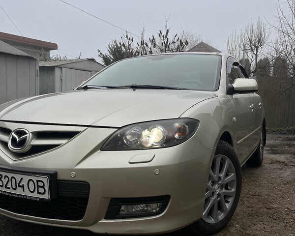 Бежевый Мазда 3, объемом двигателя 2 л и пробегом 147 тыс. км за 5000 $, фото 9 на Automoto.ua