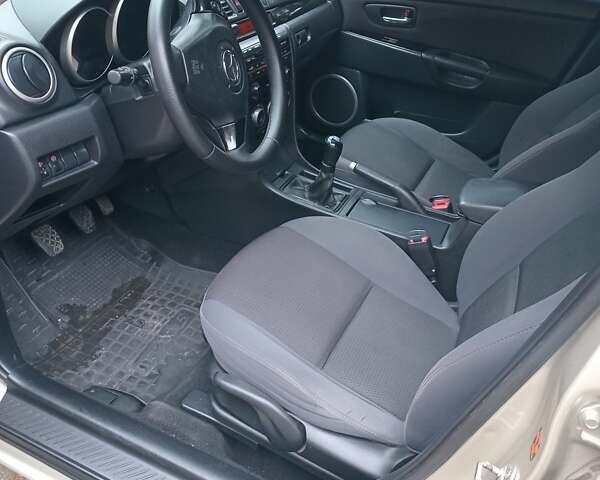 Бежевий Мазда 3, об'ємом двигуна 1.6 л та пробігом 223 тис. км за 5400 $, фото 5 на Automoto.ua