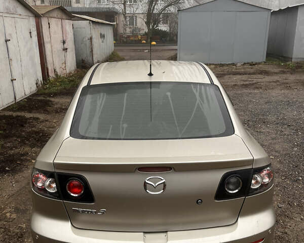 Бежевый Мазда 3, объемом двигателя 2 л и пробегом 147 тыс. км за 5000 $, фото 6 на Automoto.ua