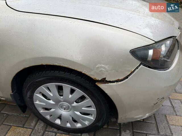 Бежевий Мазда 3, об'ємом двигуна 1.6 л та пробігом 230 тис. км за 5000 $, фото 12 на Automoto.ua