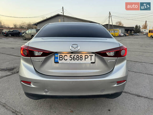 Бежевый Мазда 3, объемом двигателя 2 л и пробегом 200 тыс. км за 10000 $, фото 4 на Automoto.ua