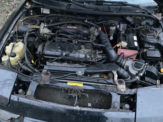 Черный Мазда 3, объемом двигателя 1.8 л и пробегом 313 тыс. км за 674 $, фото 6 на Automoto.ua