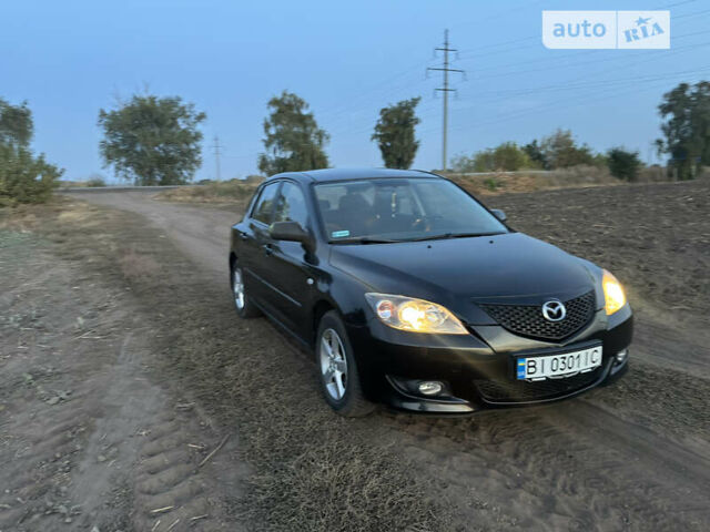 Черный Мазда 3, объемом двигателя 1.6 л и пробегом 155 тыс. км за 4300 $, фото 8 на Automoto.ua