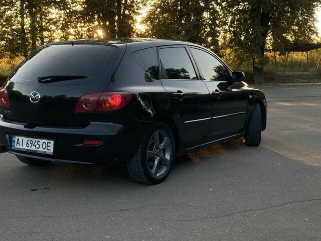 Черный Мазда 3, объемом двигателя 1.6 л и пробегом 237 тыс. км за 4100 $, фото 3 на Automoto.ua