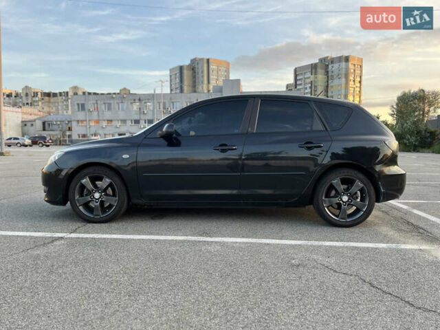 Черный Мазда 3, объемом двигателя 2 л и пробегом 215 тыс. км за 4050 $, фото 3 на Automoto.ua