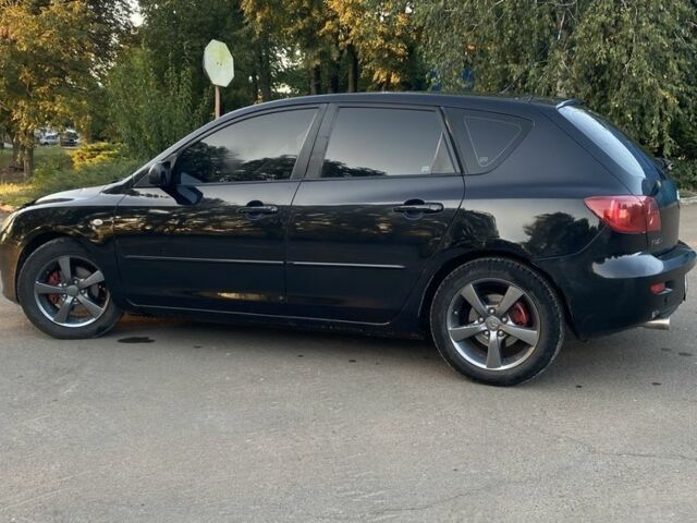 Черный Мазда 3, объемом двигателя 1.6 л и пробегом 237 тыс. км за 4100 $, фото 4 на Automoto.ua