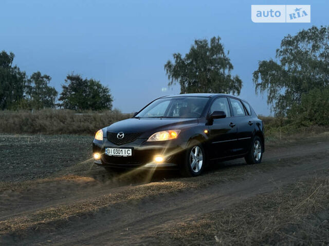Черный Мазда 3, объемом двигателя 1.6 л и пробегом 155 тыс. км за 4300 $, фото 1 на Automoto.ua