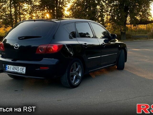 Чорний Мазда 3, об'ємом двигуна 1.6 л та пробігом 237 тис. км за 4100 $, фото 3 на Automoto.ua