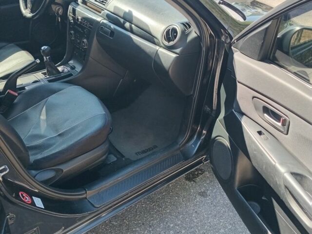 Чорний Мазда 3, об'ємом двигуна 2 л та пробігом 225 тис. км за 3000 $, фото 7 на Automoto.ua