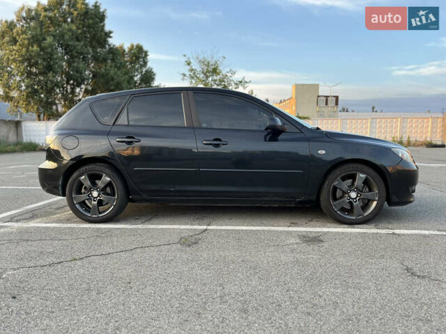 Черный Мазда 3, объемом двигателя 2 л и пробегом 215 тыс. км за 4050 $, фото 4 на Automoto.ua