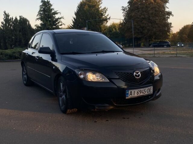 Черный Мазда 3, объемом двигателя 1.6 л и пробегом 237 тыс. км за 4100 $, фото 1 на Automoto.ua
