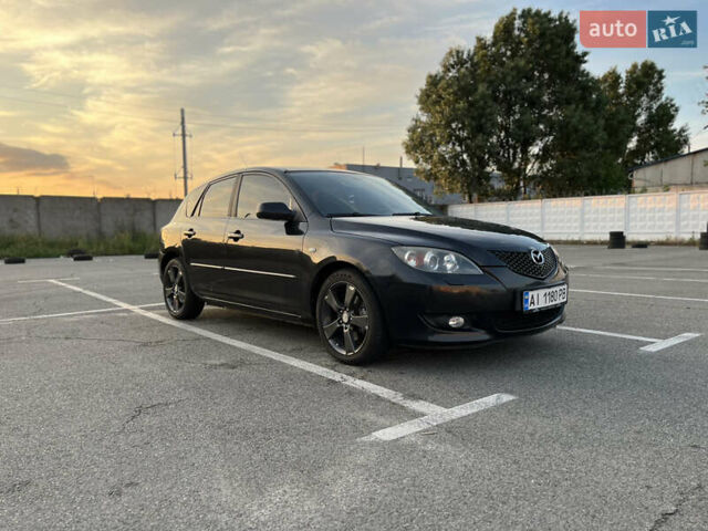 Черный Мазда 3, объемом двигателя 2 л и пробегом 215 тыс. км за 4050 $, фото 1 на Automoto.ua