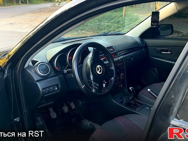 Чорний Мазда 3, об'ємом двигуна 1.6 л та пробігом 237 тис. км за 4100 $, фото 5 на Automoto.ua