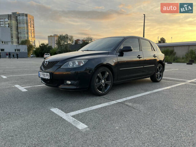 Черный Мазда 3, объемом двигателя 2 л и пробегом 215 тыс. км за 4050 $, фото 2 на Automoto.ua